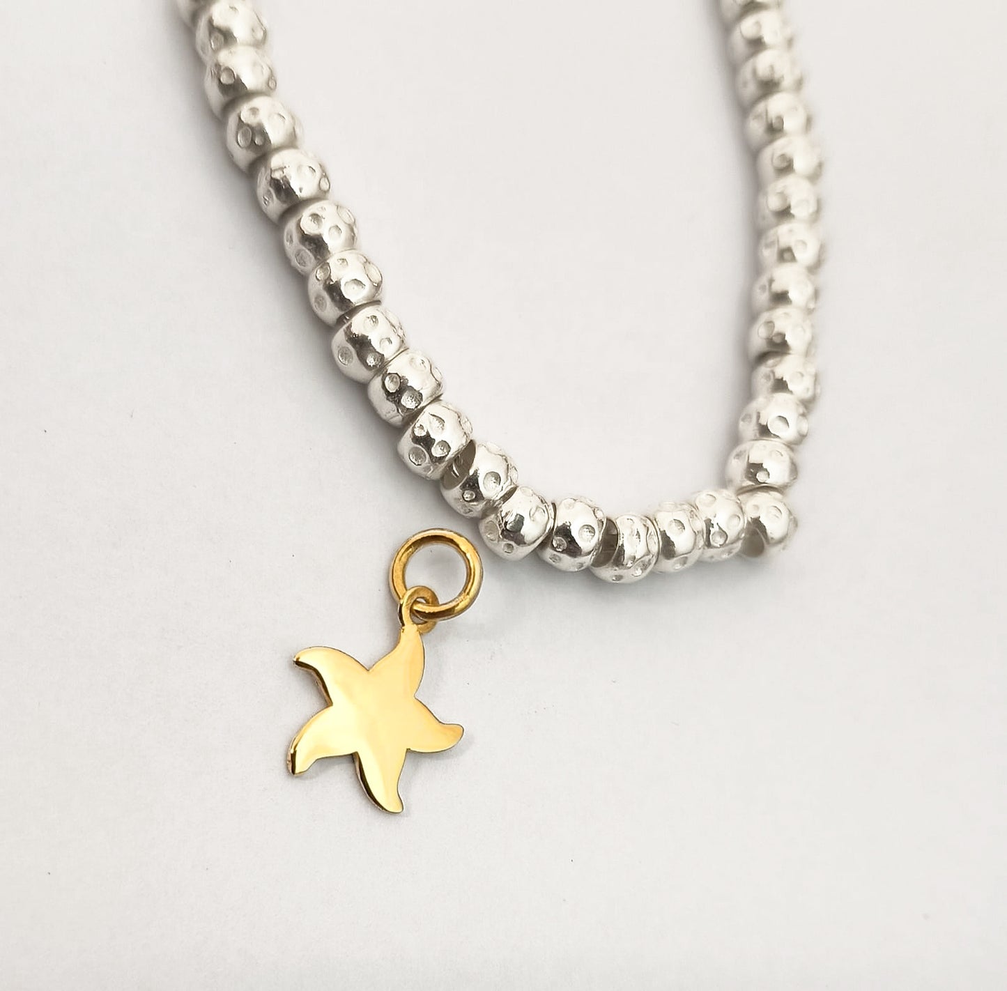 ciondolo a forma di stella marina gioiello artigianale in argento 925 placcato oro