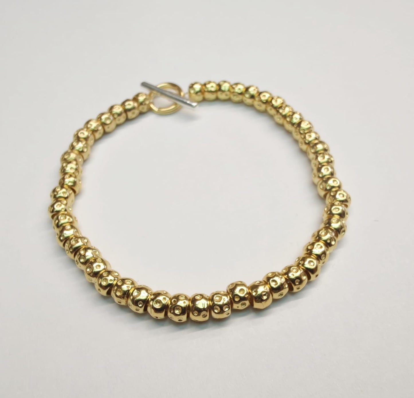 Bracciale granelli in argento con placcatura oro giallo