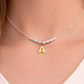 dettaglio collana argento con iniziale e lettera oro personalizzata