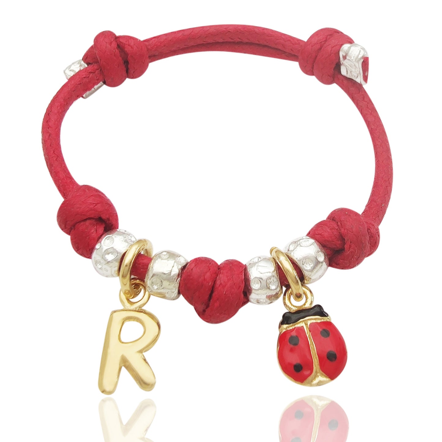 gioielli bambini argento bebè bracciale braccialino cordino pepite granelli tipo simil dodo mariani ciondoli pendenti charms lettera iniziale nome coccinelle smaltata portafortuna vendita online gioielli artigianali in argento