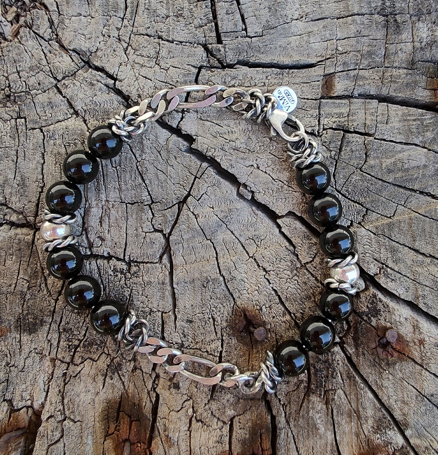 Bracciale uomo con palline nere e catena cubana, perfetto per un look casual o elegante