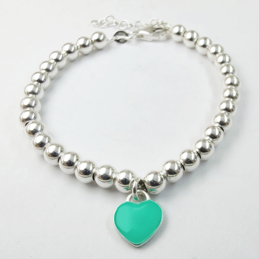 bracciale tiffany cuore azzurro verde prezzo basso offerta outlet