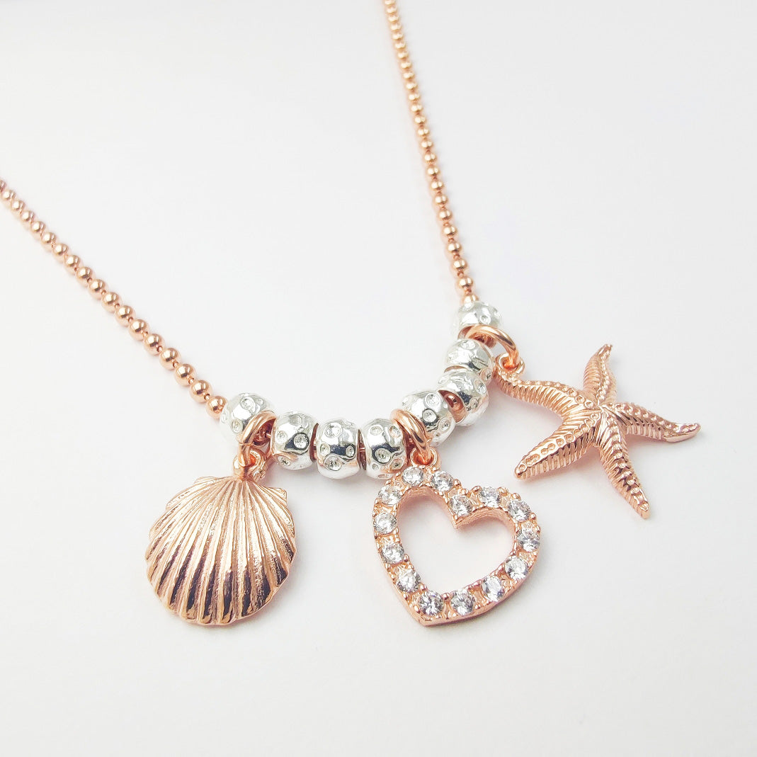 gioiello collana a girocollo in argento 925 catenina a palline bollicine tipo simil doto granelli pepite grani ciondolo charm pendente stella marina cuore con zirconi conchiglia vendita online gioielli artigianali a prezzo basso scontato offerta