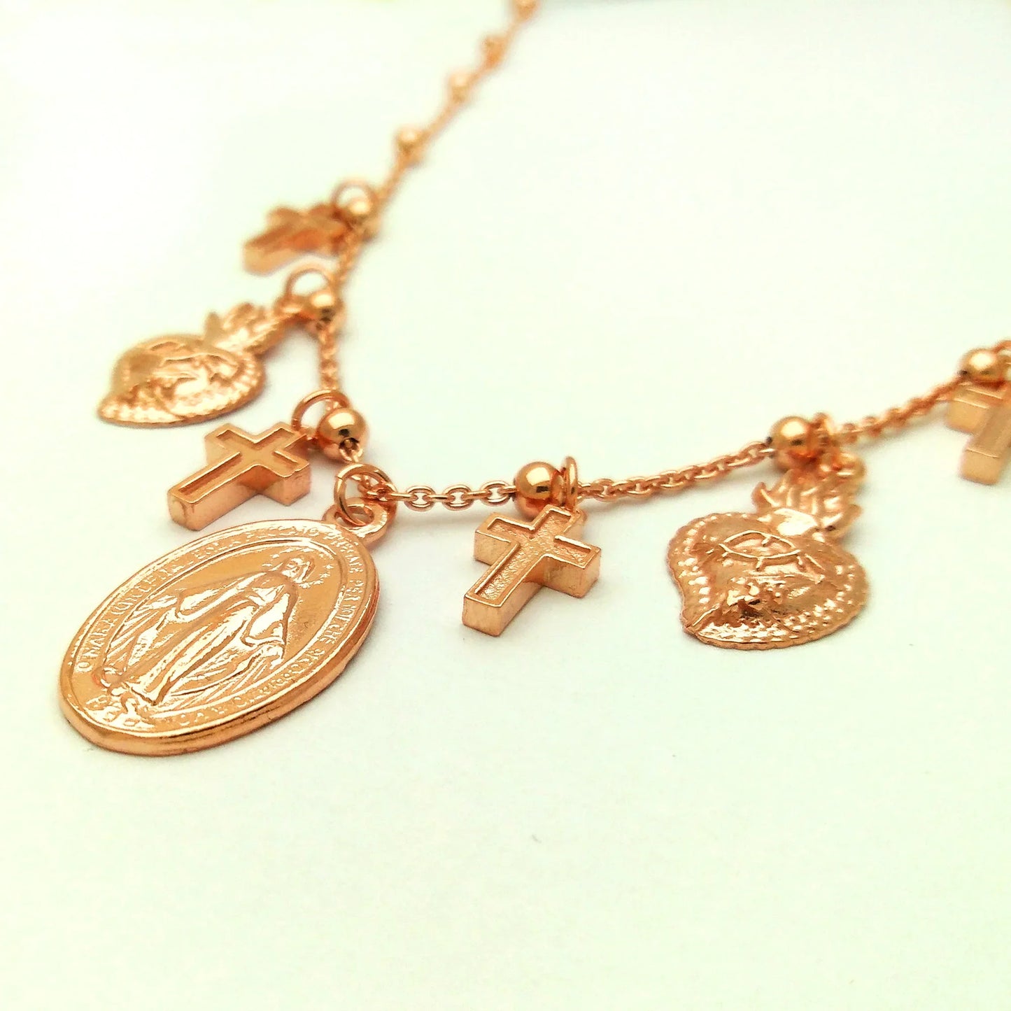 collanina catenina con medaglia madonnina miracolosa di luordes fatima del carmelo e con ciondoli sacro cuore e croci in argento 925 placcato oro rosa 
